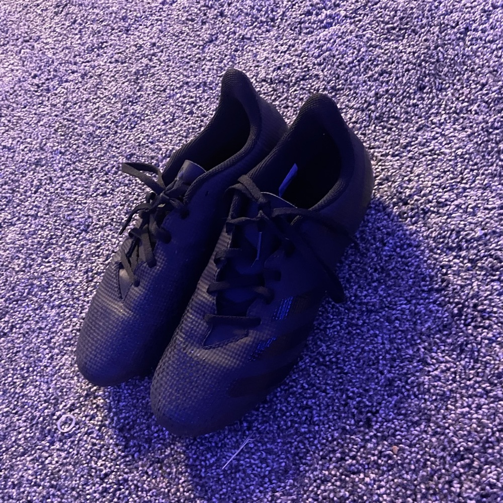 Black adidas soccer cleats
